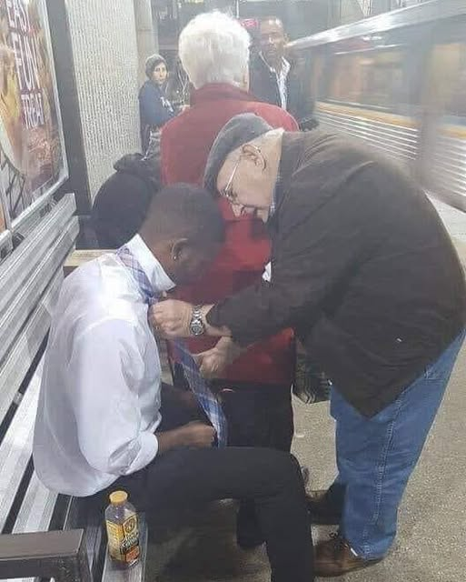 A Tie, a Touch, and a Moment of Community…b